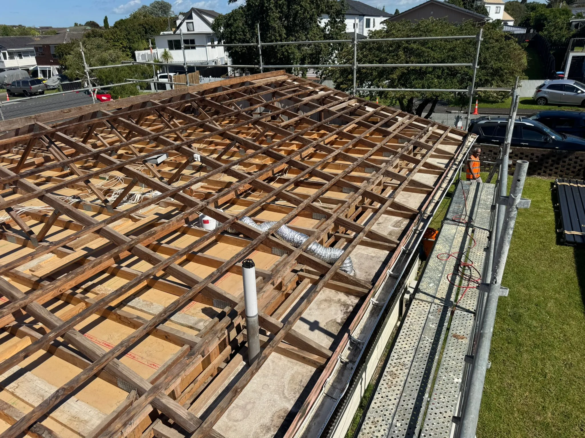 After — tiles removed, roof structure clear — Ellerslie decramastic roof asbestos removal