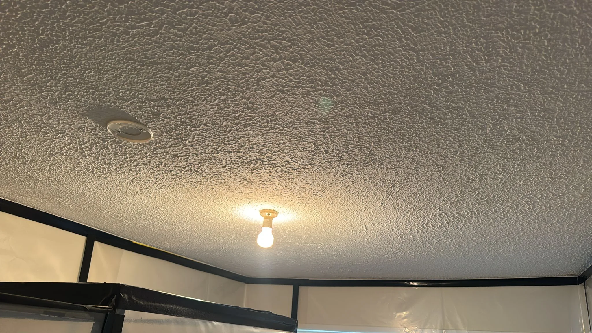 BEFORE — textured ceiling asbestos removal