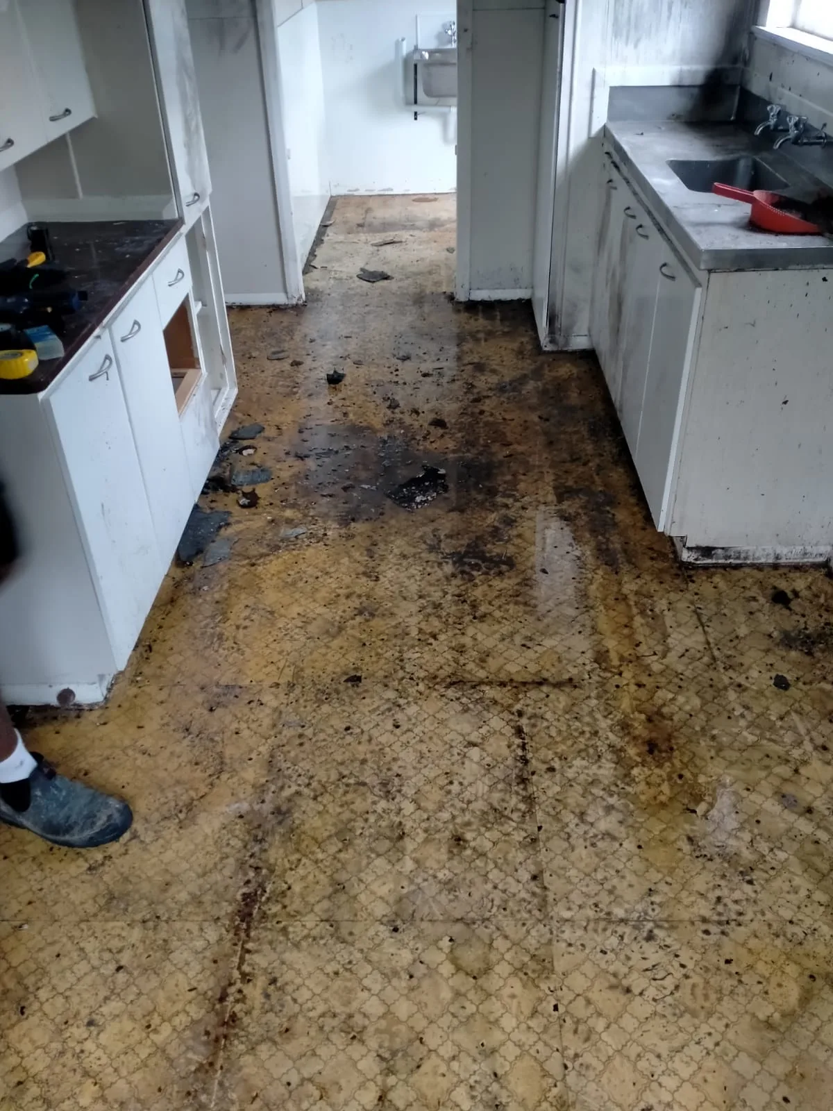 BEFORE — Three Kings vinyl asbestos floor removal